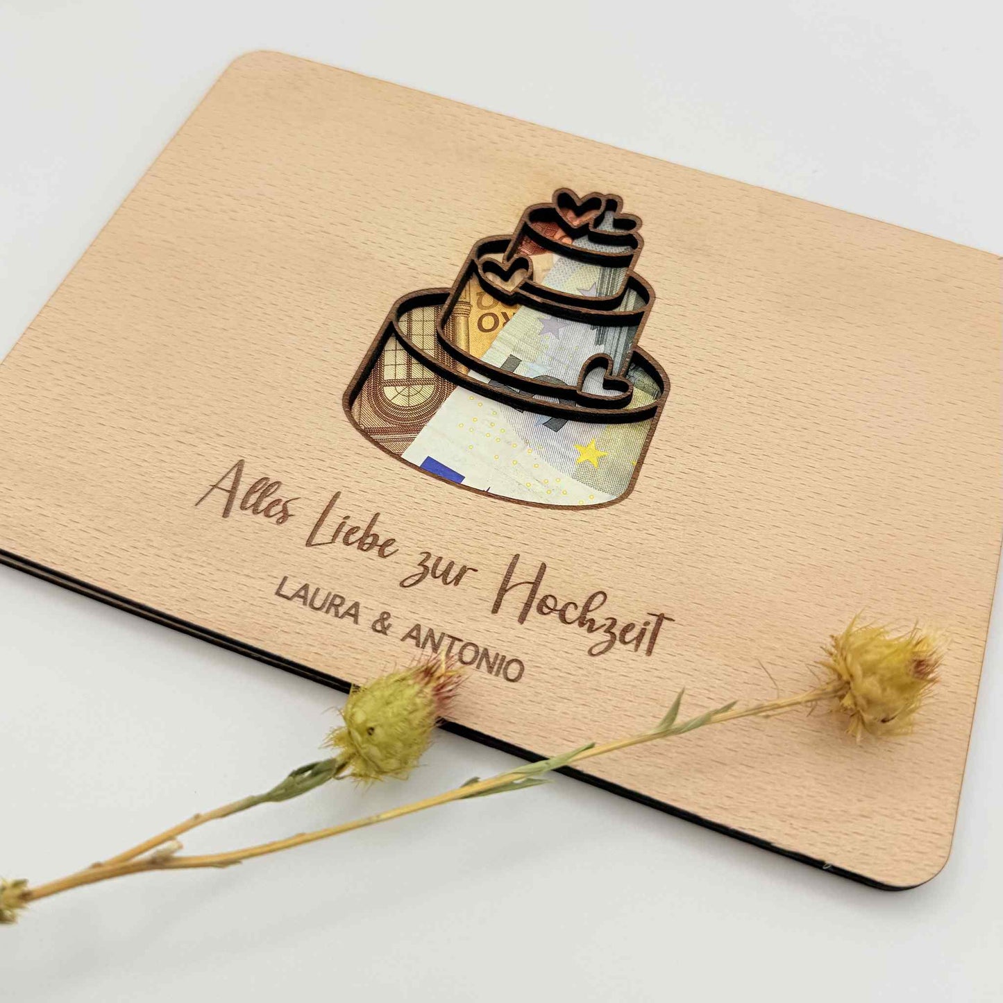 Ein personalisiertes Geschenk zur Hochzeit mit Geld.