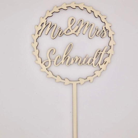 Ein personalisierter Cake Topper zur Hochzeit mit Mr & Mrs