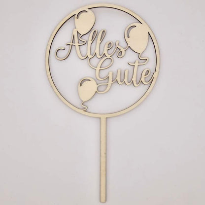 Ein Cake Topper zum Geburtstag mit dem "Alles Gute" Wunsch 