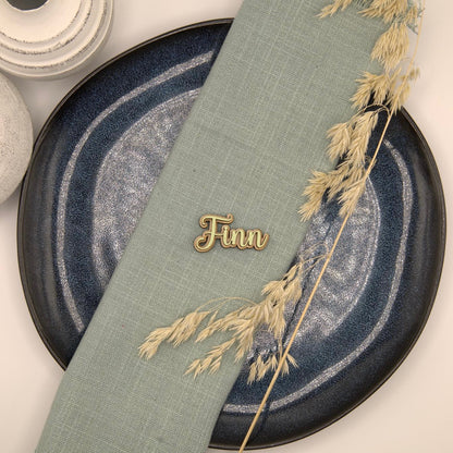 Personalisierter Magnet mit Namen "Finn" auf einer Serviette