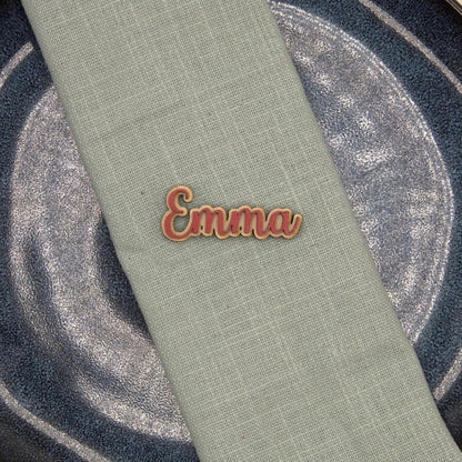 Personalisierter Magnet mit Namen "Emma" auf einer blaue Serviette