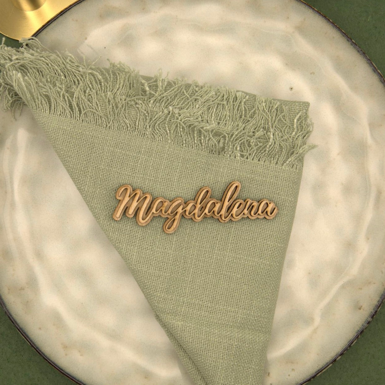 Personalisierter Magnet mit Namen "Magdalena" auf einem Teller
