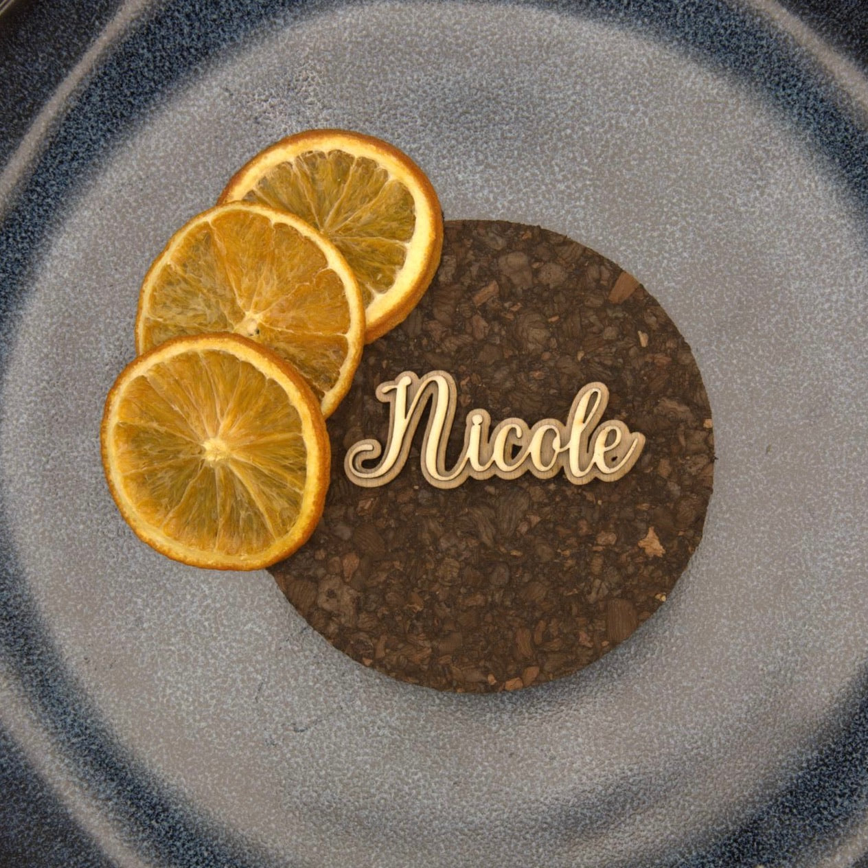 Personalisierter Magnet mit Namen "Nicole" und Orangenscheiben
