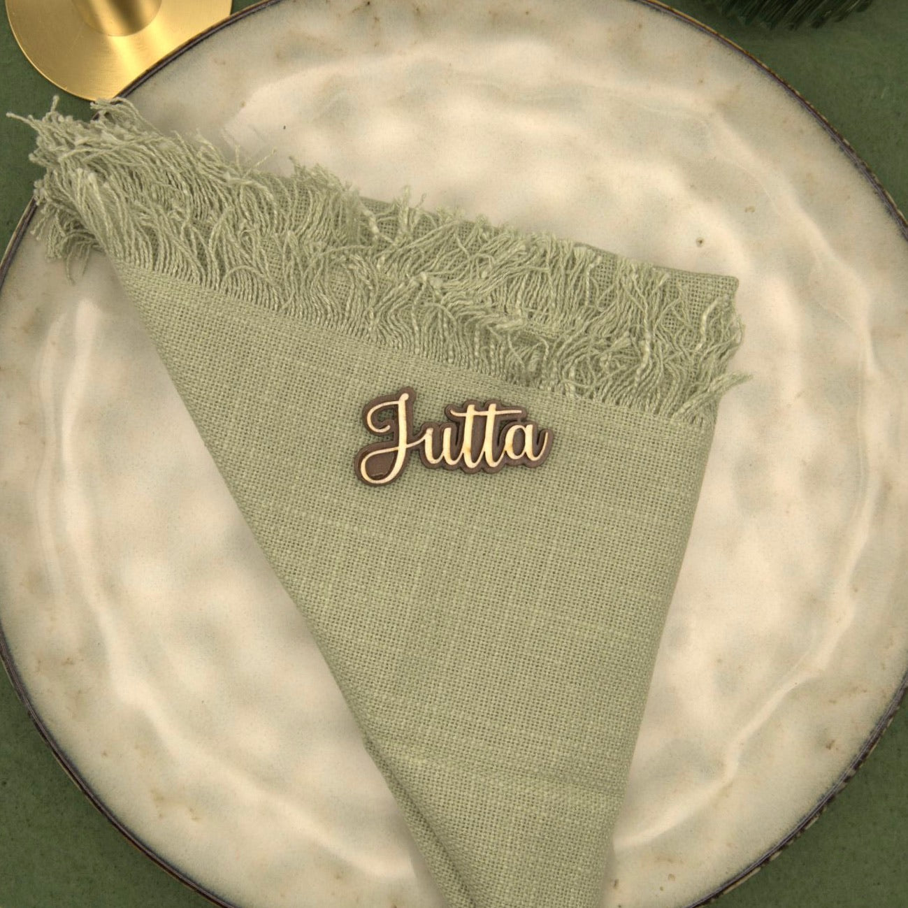 Personalisierter Magnet mit Namen "Jutta" auf einer Serviette
