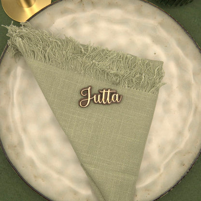 Personalisierter Magnet mit Namen "Jutta" auf einer Serviette